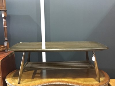 Lot 137 - Ercol dark wood coffee table of rectangular form on four turned legs joined by stretchers, 105 x 37 x 46cm