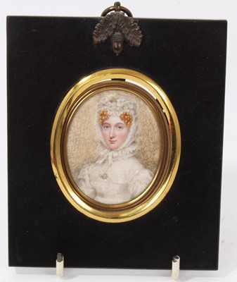 Lot 672 - John Barry (act. 1784-1827) portrait miniature on ivory, portrait of a young lady named verso as Mrs Hay Newton nee Miss Gregson, oval, glazed papier mache frame, total size 13 x 10cm, label to the...