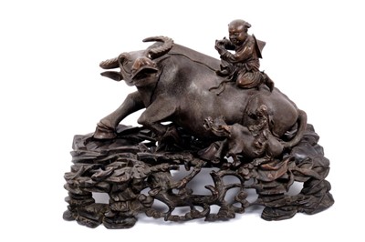 Lot 746 - Good late 19th / early 20th century Chinese carved wood buffalo on stand