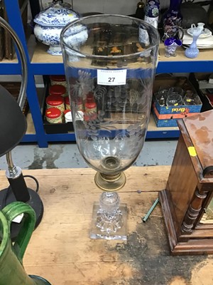 Lot 27 - Early 19th Glass Storm lantern / candle stick with gilt metal mount on lemon squeezer base, with later etched glass shade