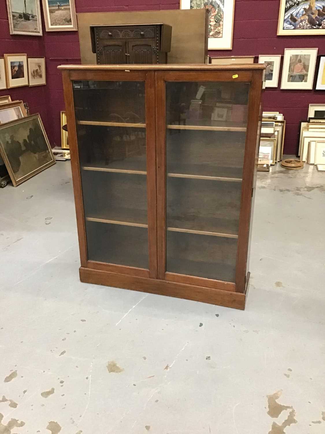 Lot 912 Mahogany book case enclosed by a pair of