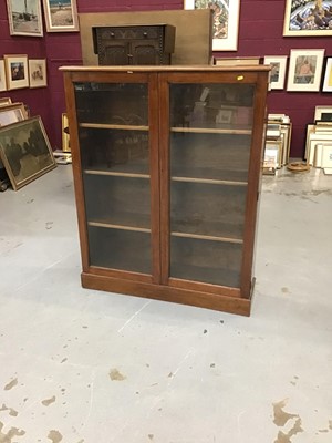 Lot 912 - Mahogany book case enclosed by a pair of glazed doors