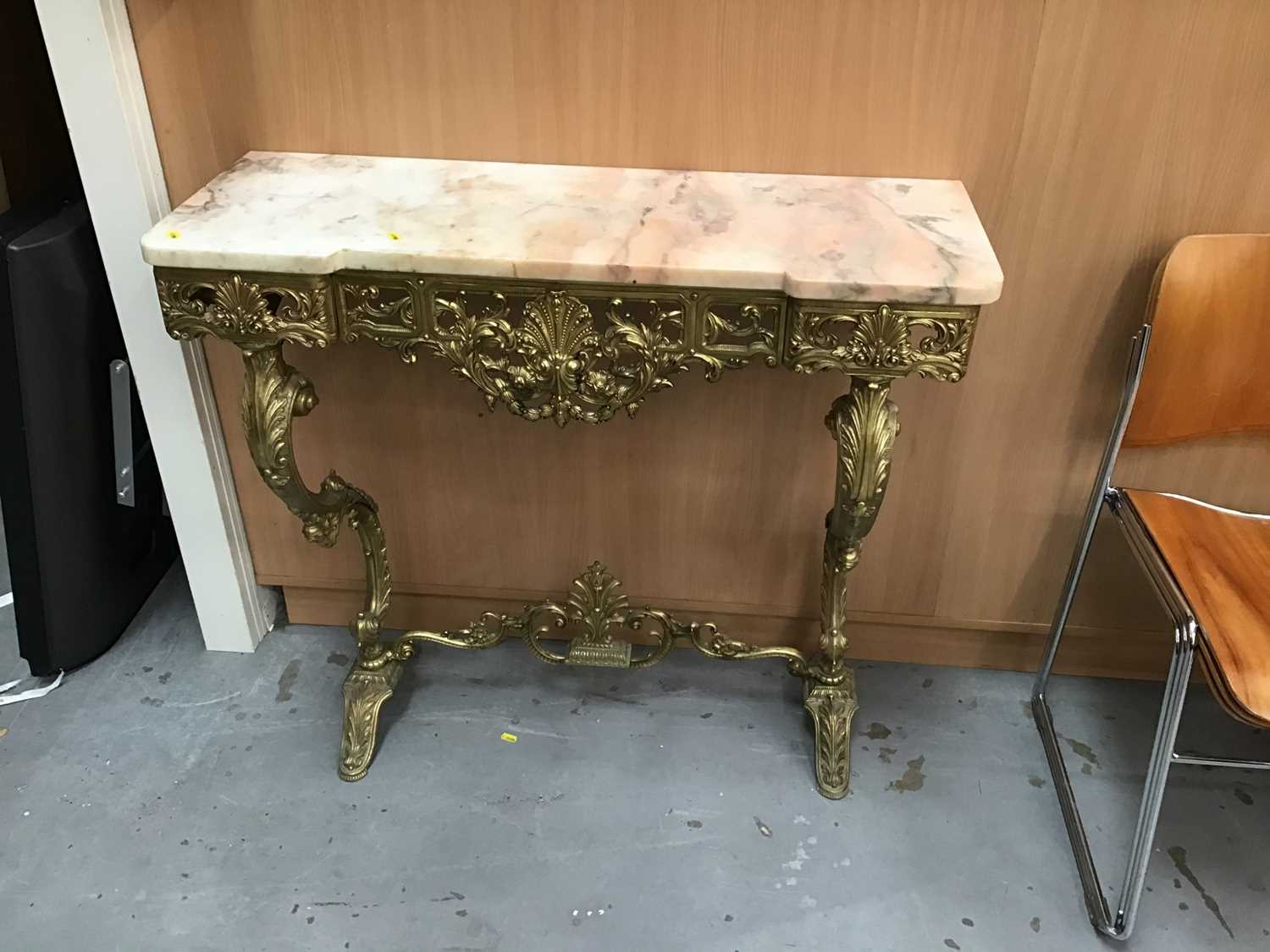 Lot 945 - Ornate gilt metal marble topped console table