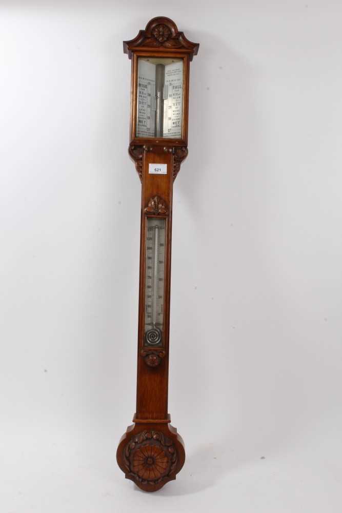 Lot 621 - Late Victorian oak carved barometer