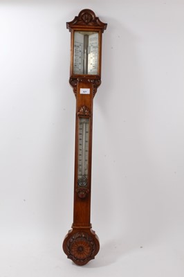 Lot 644 - Late Victorian oak carved barometer