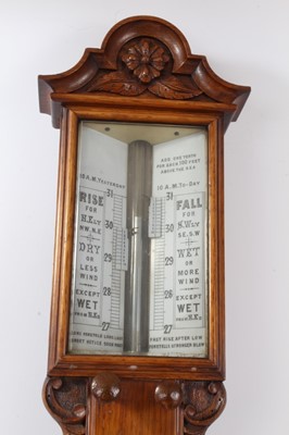 Lot 621 - Late Victorian oak carved barometer