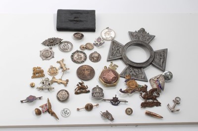 Lot 627 - First World War silver War badge (naming erased) together with a silver ARP badge and group of other military badges