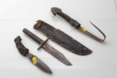 Lot 708 - Unusual First World War trench fighting knife with shrapnel grip together with another fighting knife and an Eastern dagger (3)