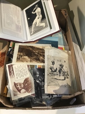 Lot 252 - Box of postcards and an album of postcards