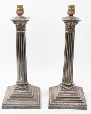 Lot 731 - Pair of late 19th / early 20th century electroplated Corinthian column lamps, by H E & Co