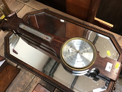Lot 62 - Wall barometer and an oak framed wall mirror