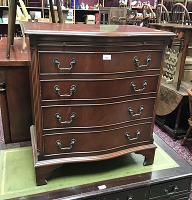 Lot 988 - Mahogany serpentine fronted chest with brushing slide and three drawers below