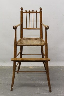 Lot 1244 - 19th century child’s beech high chair with caned seat