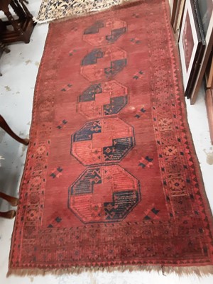 Lot 1011 - Eastern rug with geometric decoration on a red ground, together with another similar rug (2)