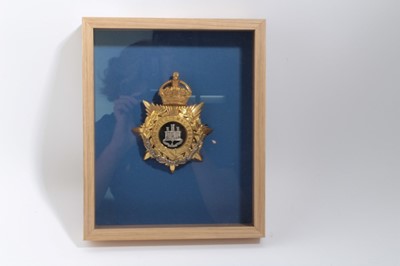 Lot 630 - Edwardian bi-metal Suffolk Regiment Officers' helmet plate, mounted in glazed frame