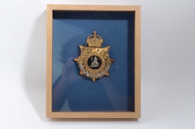 Lot 629 - Edwardian bi-metal Norfolk Regiment Officers' helmet plate, mounted in glazed frame