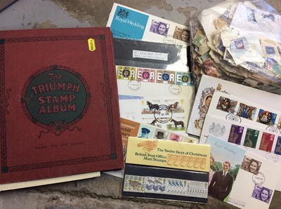 Lot 403 - Triumph stamp album together with a bag of loose stamps