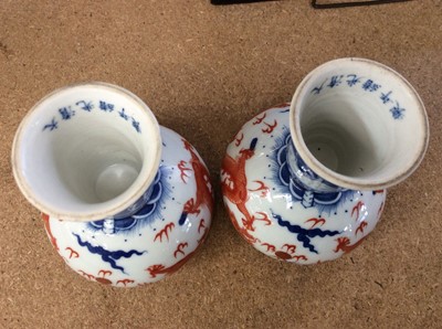 Lot 230 - Two pairs of Chinese porcelain stem bowls painted with dragons