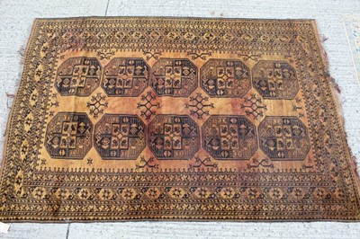 Lot 1391 - Old Afghan carpet on gold ground