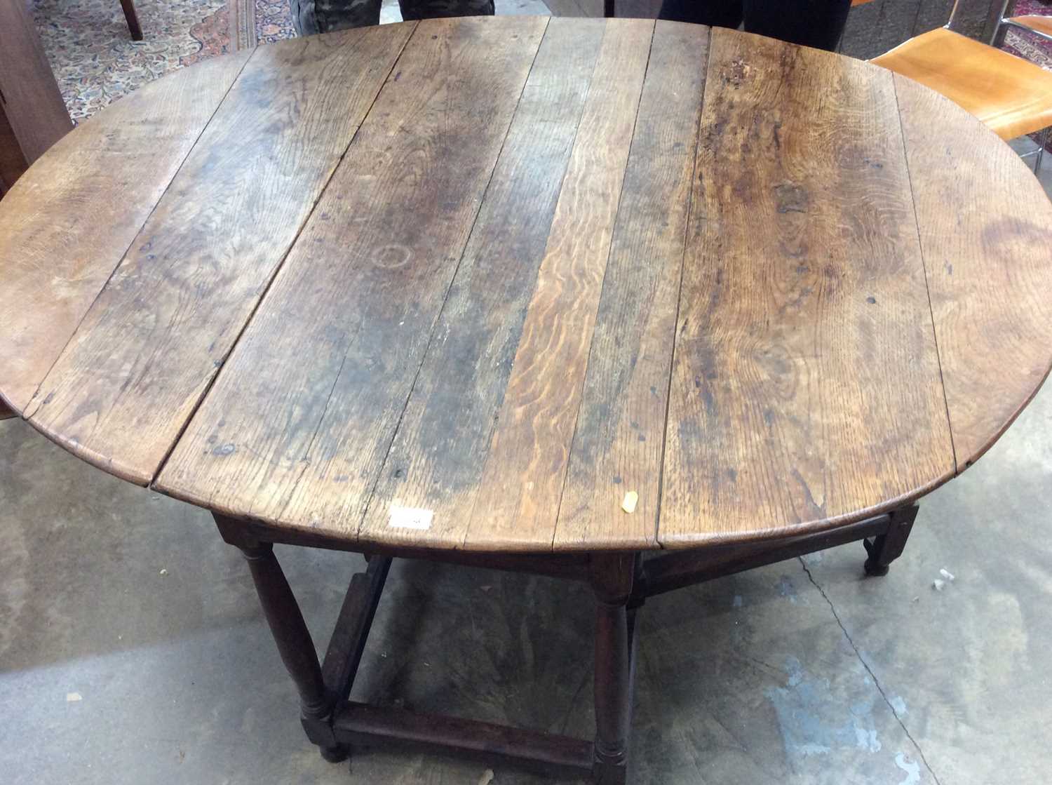 Lot 1388 - 18th century oak drop leaf dining table