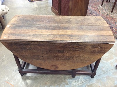 Lot 1388 - 18th century oak drop leaf dining table