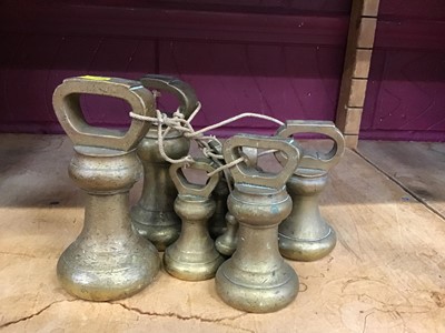 Lot 548 - Set of brass weights