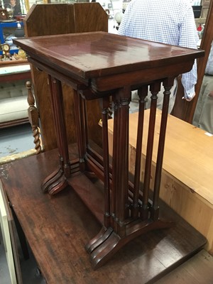 Lot 899 - Nest of four Edwardian inlaid mahogany occasional tables, on turned supports