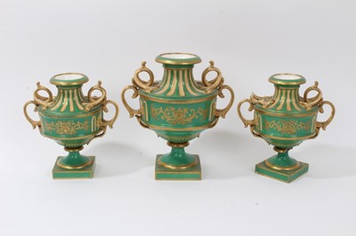 Lot 111 - Garniture of three 19th century porcelain vases
