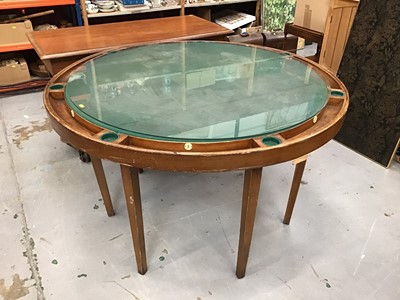 Lot 1021 - Games table of circular form with green baize top and glass cover