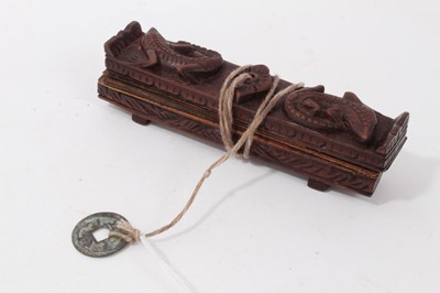 Lot 747 - Antique Tibetan prayers strips with carved hardwood casing