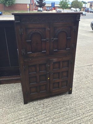 Lot 975 - Reprodux Old charm style drinks cabinet