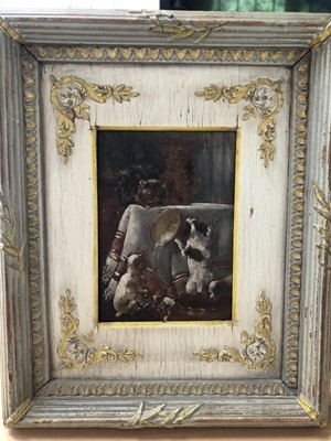 Lot 142 - Edwardian oil on paper over a printed base, laid on panel - dogs upsetting a bowl of milk from two cats, in decorative painted frame