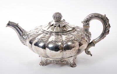 Lot 243 - George IV silver teapot of melon form