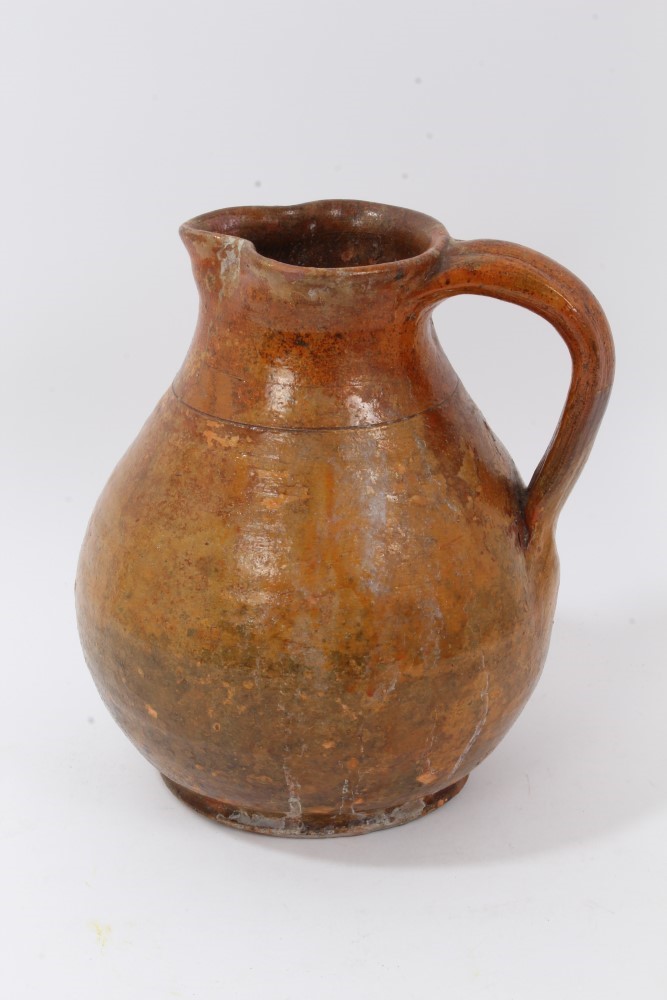 Lot 168 - Good 17th century pottery glazed jug