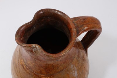 Lot 168 - Good 17th century pottery glazed jug