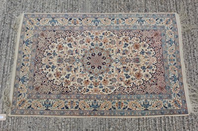 Lot 1397 - Good quality Persian silk rug with central...