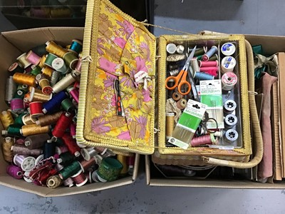 Lot 591 - Four boxed of sewing accessories including large selection of coloured threads, wicker sewing box, beads, fabric samples etc