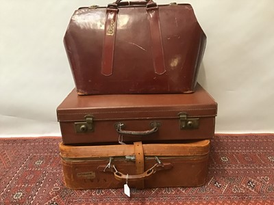 Lot 1817 - Three vintage leather suitcases