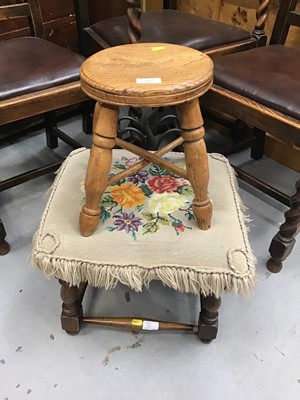 Lot 925 - Old elm milking stool and  old footstool with tapestry seat (2)