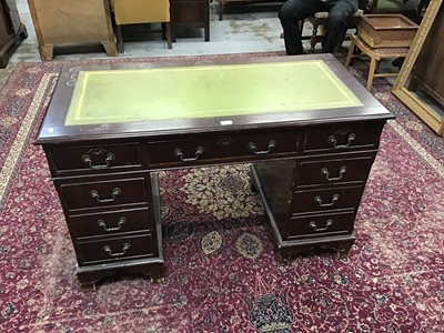 Lot 862 - Reproduction twin pedestal desk with green leather lined top