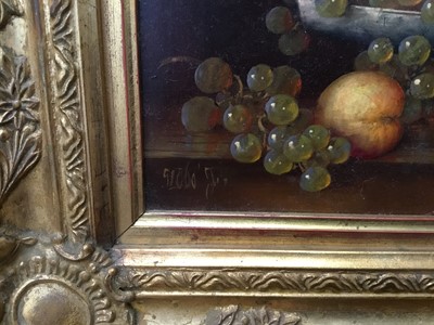 Lot 33 - Pair of Continental school oils on panel - still life of fruit, indistinctly signed, in gilt frames