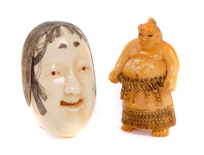 Lot 229 - 19th century carved ivory netsuke in the form of a sumo wrestler together with a noh mask
