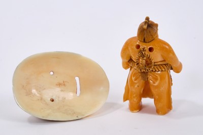 Lot 229 - 19th century carved ivory netsuke in the form of a sumo wrestler together with a noh mask