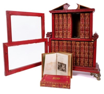 Lot 764 - Unusual miniature bookcase, housing set of leather bound volumes