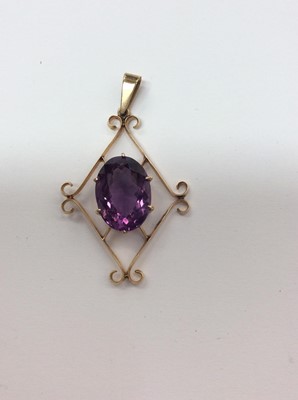 Lot 656 - Victorian 15ct gold amethyst open work pendant