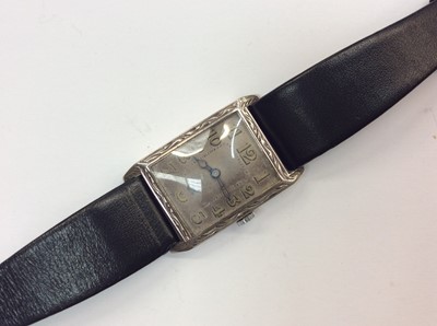 Lot 660 - Vintage silver cased wristwatch on later black leather strap