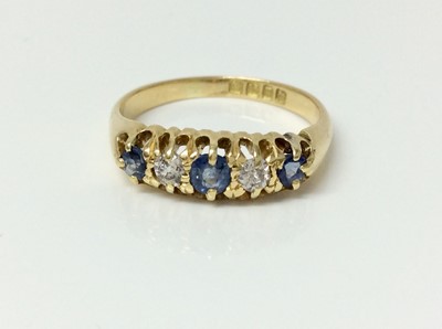 Lot 462 - Edwardian five stone diamond and sapphire ring in claw setting on 18ct gold shank