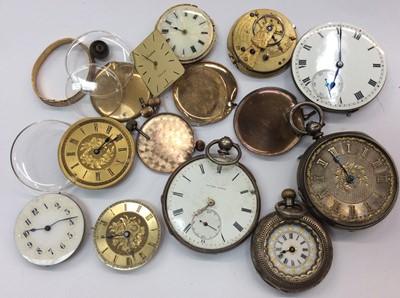 Lot 662 - Two silver cased pocket watches and other watch parts