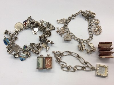 Lot 669 - Two silver charm bracelets, one other bracelet and two bank note charms