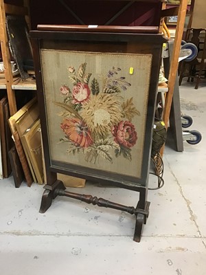 Lot 941 - Victorian firescreen with floral embroidered panel in mahogany frame on splayed legs